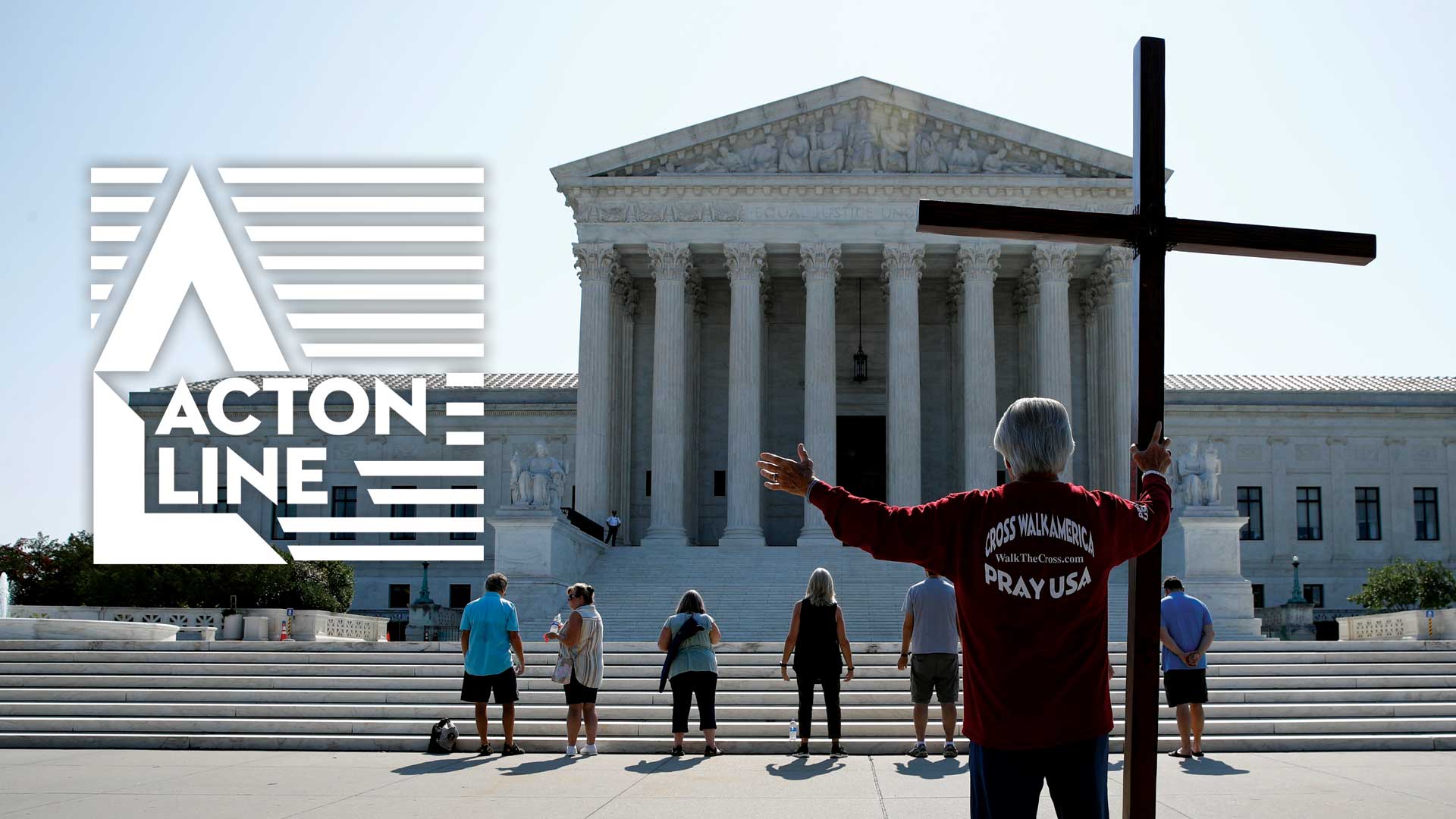 Man praying outside the SCOTUS building